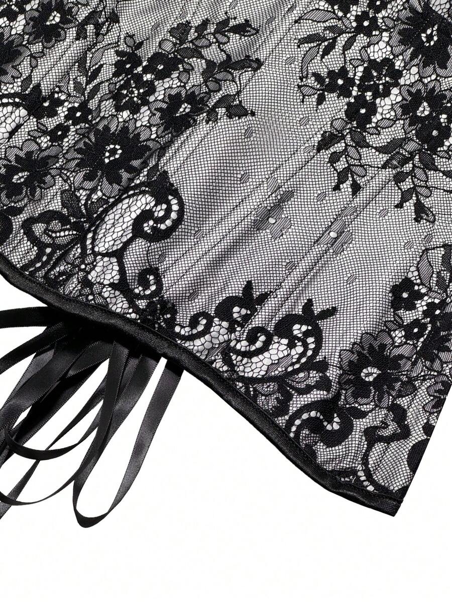 Black women's shaping cami with contrast lace, spaghetti straps, asymmetrical hem, lined body, and slim fit for casual and night-out styling.