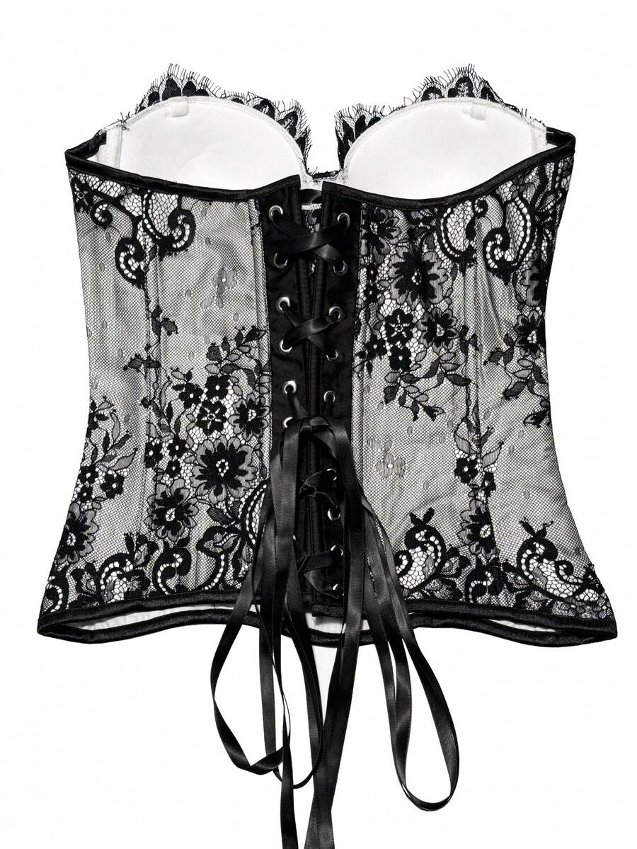 Black women's shaping cami with contrast lace, spaghetti straps, asymmetrical hem, lined body, and slim fit for casual and night-out styling.