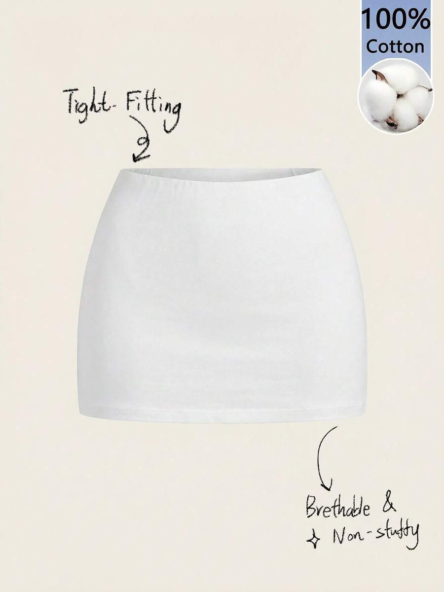 Women's white 100% cotton low waist mini skirt featuring a tropical print and zipper detail.