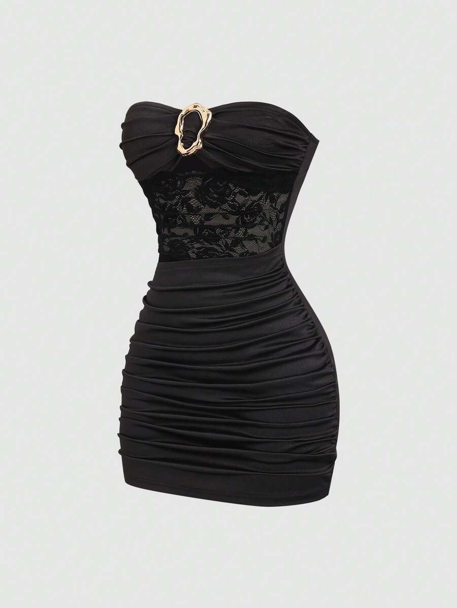 Women's black strapless bodycon mini dress featuring ruched detailing, cut-out design with ring accent, mid-waist pencil hem, and slim fit knitted stretch fabric.