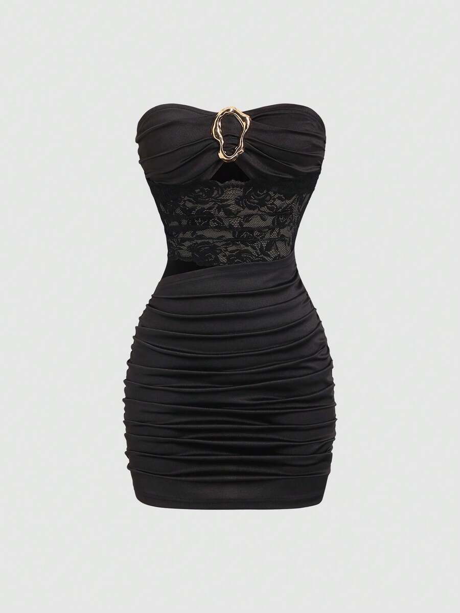 Women's black strapless bodycon mini dress featuring ruched detailing, cut-out design with ring accent, mid-waist pencil hem, and slim fit knitted stretch fabric.