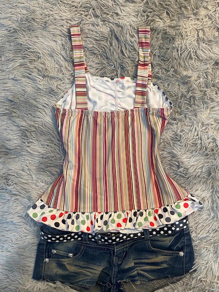 Multicolor women's wide strap tank top featuring polka dot pattern, ruched shirred bodice, and flared ruffle hem.