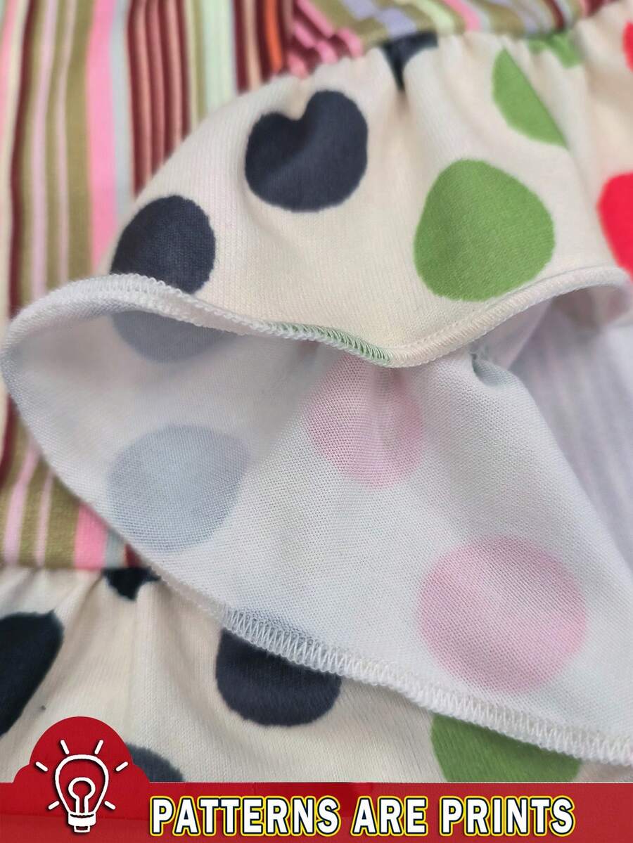 Multicolor women's wide strap tank top featuring polka dot pattern, ruched shirred bodice, and flared ruffle hem.