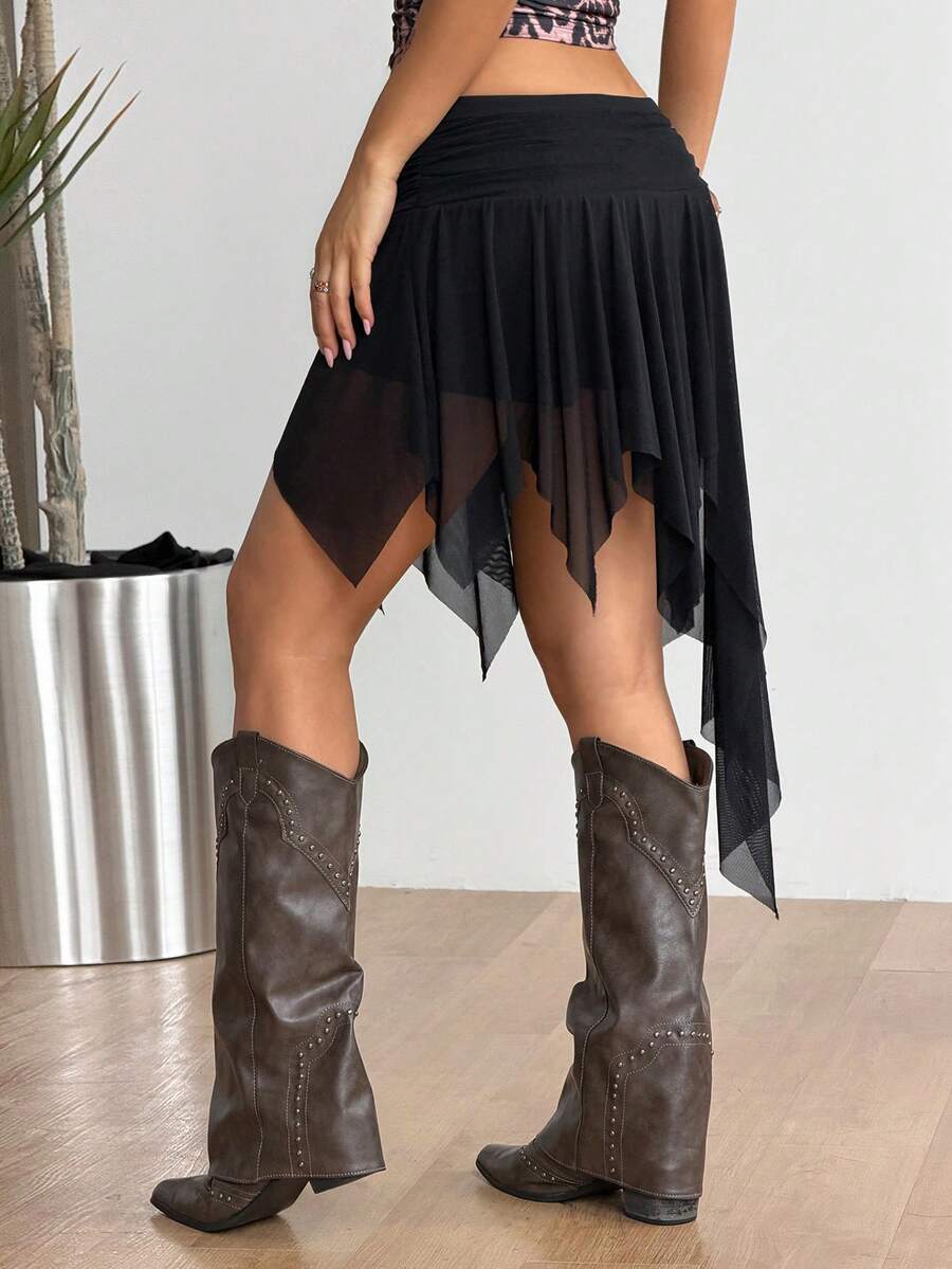 Women's asymmetrical ruffle skort with low waist, hollow out details, and lined body in knitted stretch fabric for beach and summer wear.