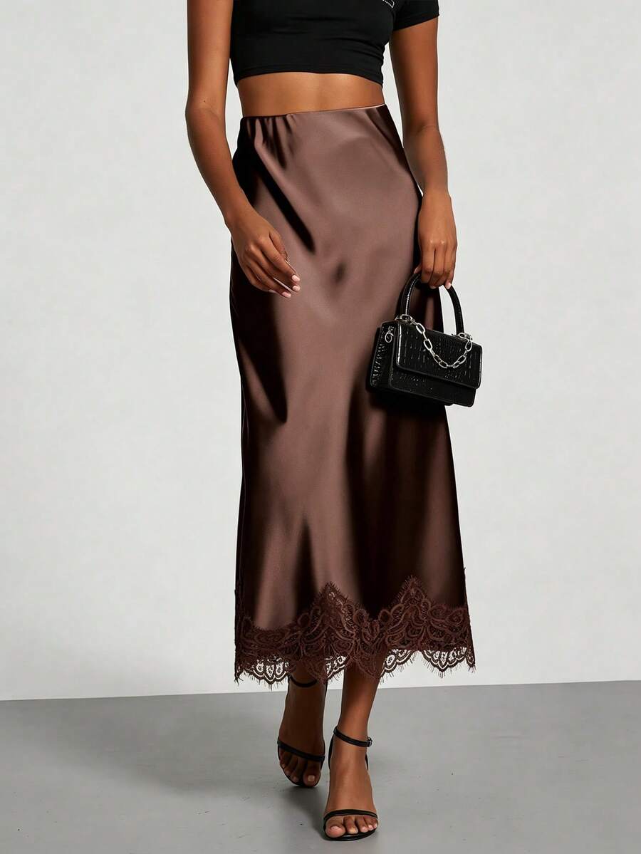 Women's brown silky satin long straight skirt featuring elegant contrast lace trim.