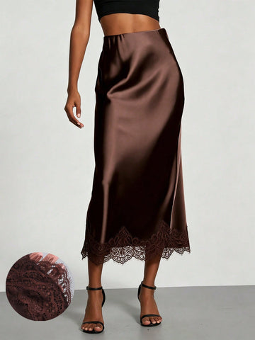 Women's brown silky satin long straight skirt featuring elegant contrast lace trim.