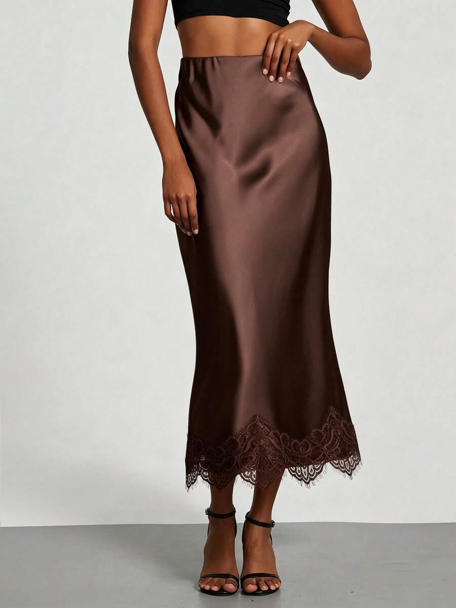 Women's brown silky satin long straight skirt featuring elegant contrast lace trim.