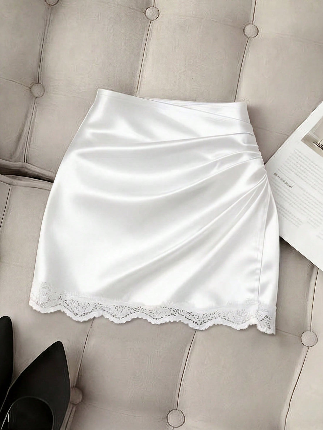 Women's high waist bodycon mini skort featuring contrast lace trim and plain knitted design.
