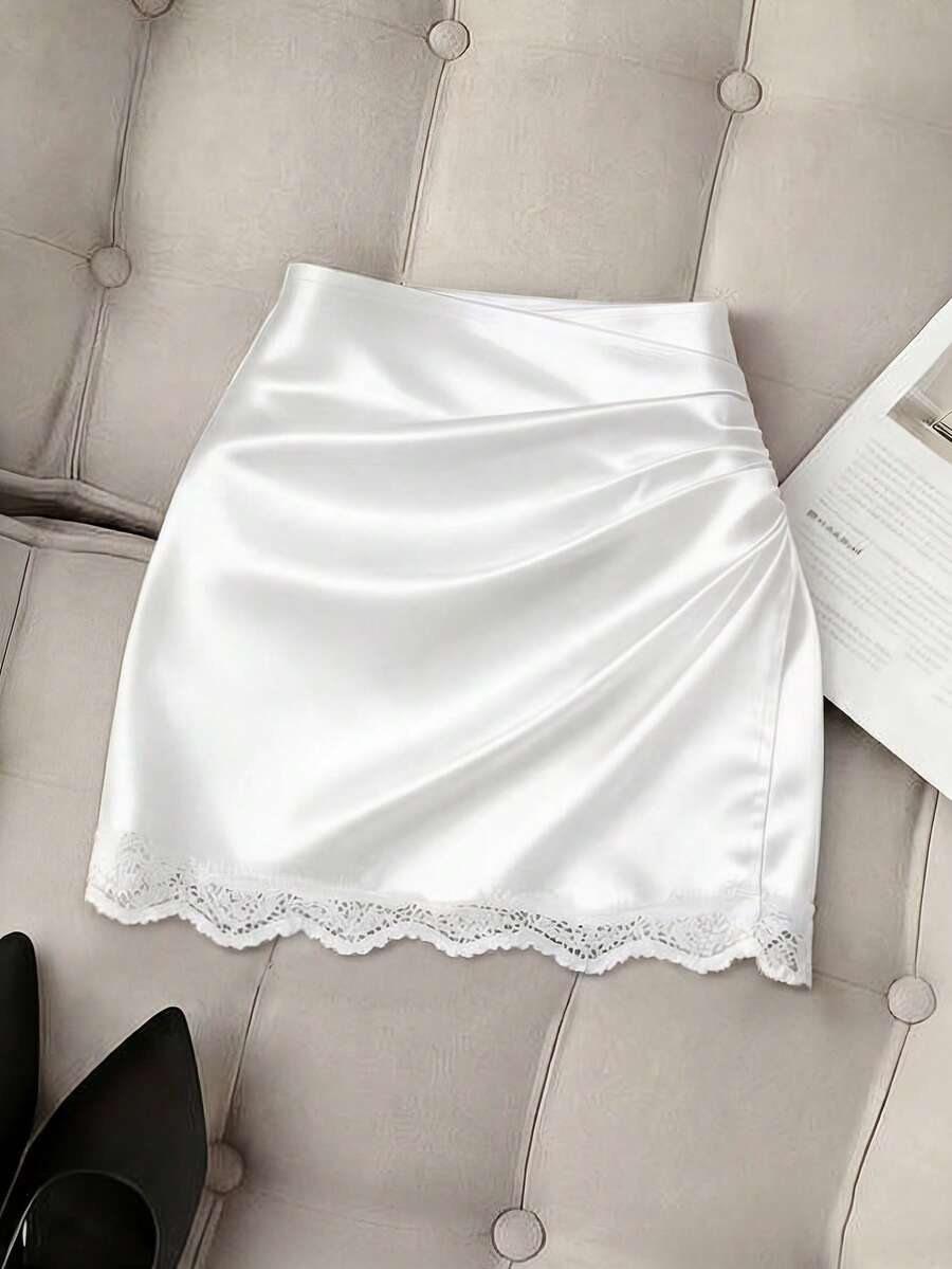 Women's high waist bodycon mini skort featuring contrast lace trim and plain knitted design.