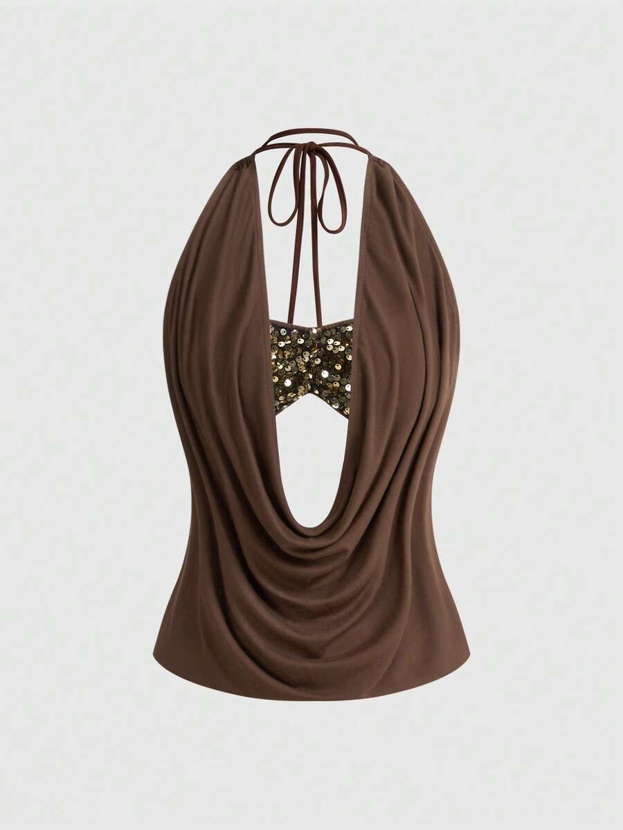 Women's black sequin halter tank top featuring a draped cowl neck and backless design