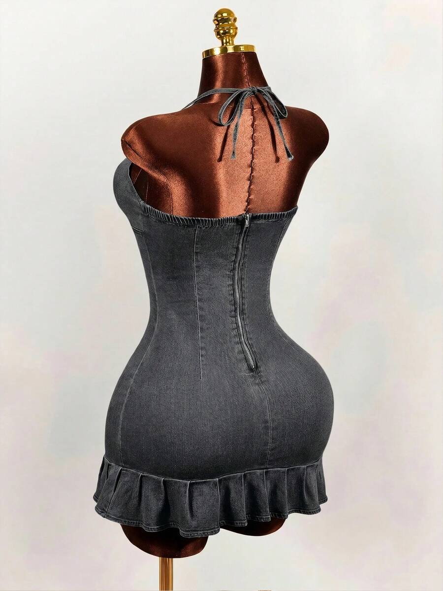 Women's blue denim halter mini dress featuring front cut-out details and a flounce ruffle hem.