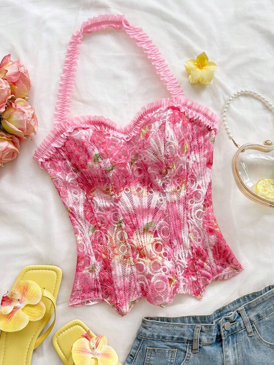 Strapless floral corset top with lace-up detail, asymmetrical hem, and slim fit for women in a boho vacation style.