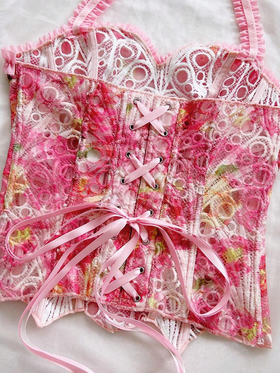 Strapless floral corset top with lace-up detail, asymmetrical hem, and slim fit for women in a boho vacation style.