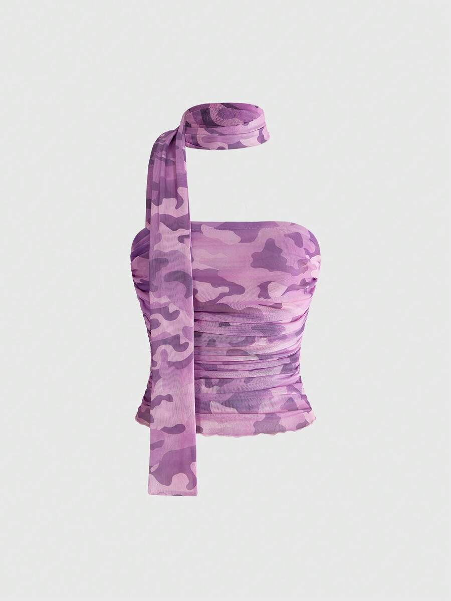Women's black polka dot strapless tube top made of ruched mesh fabric featuring an asymmetrical hem and matching scarf.