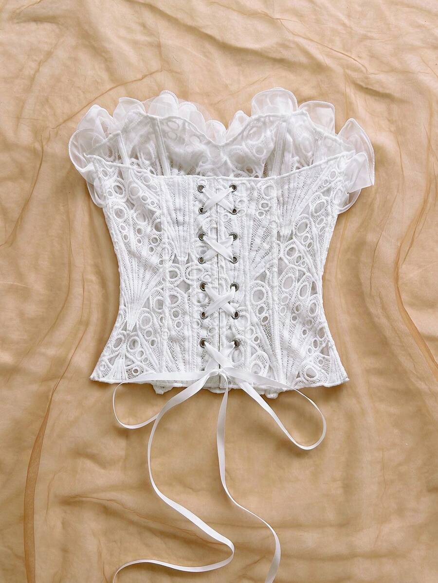Strapless floral lace corset top with lace-up detail, asymmetrical hem, and slim fit for women.