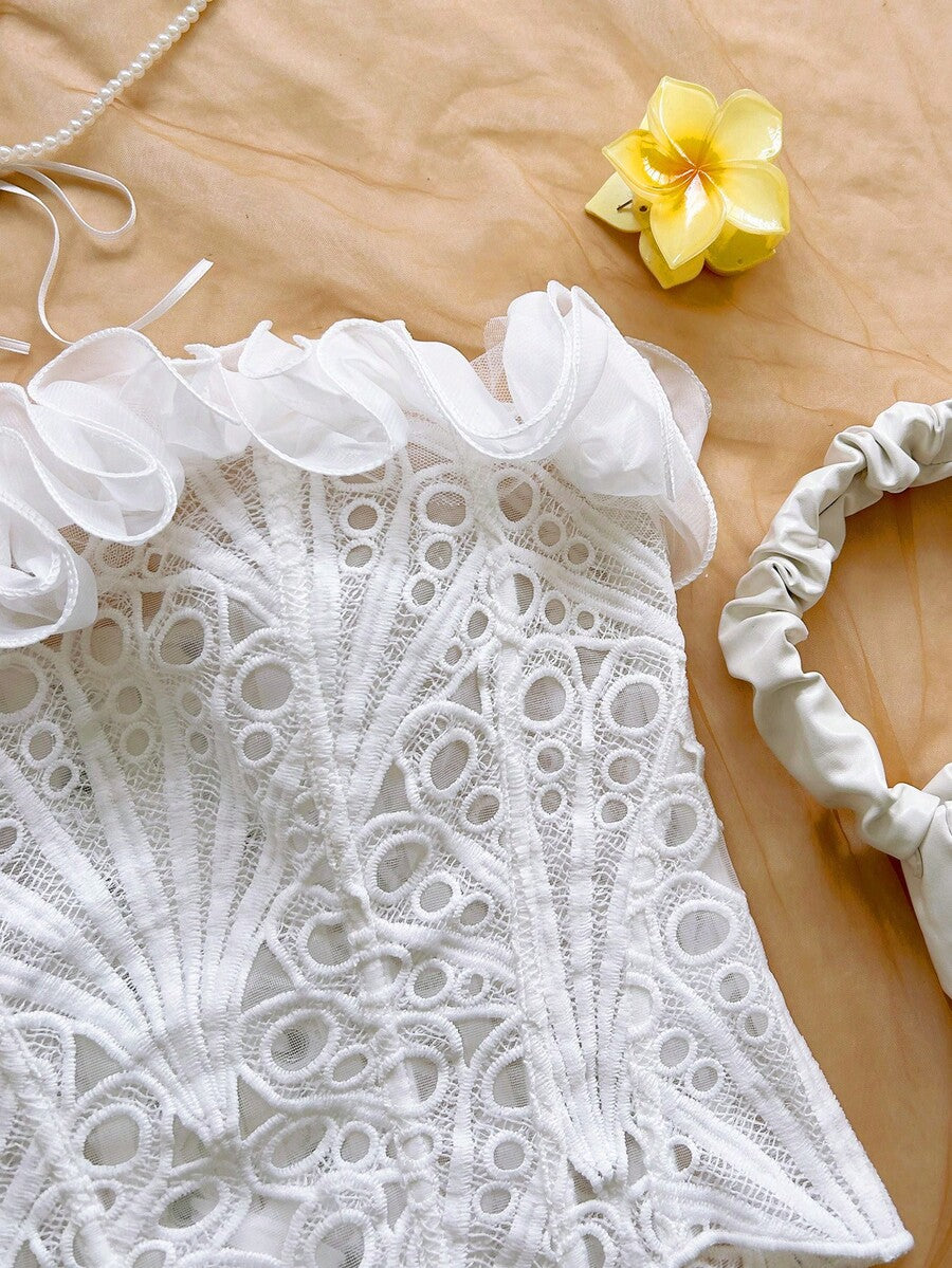 Strapless floral lace corset top with lace-up detail, asymmetrical hem, and slim fit for women.