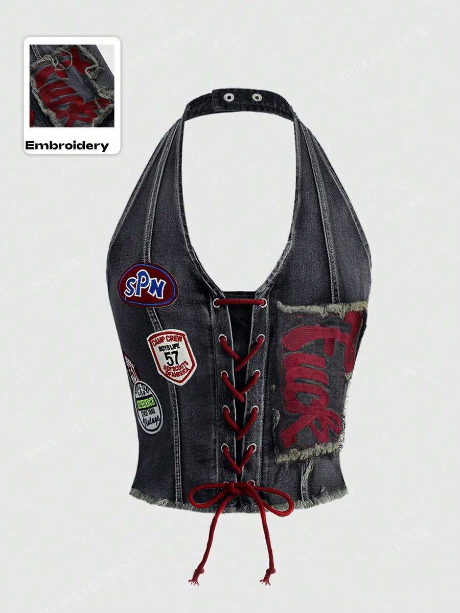 A black Y2K denim halter crop top featuring a backless lace-up grommet eyelet design with a slim fit micro crop length.