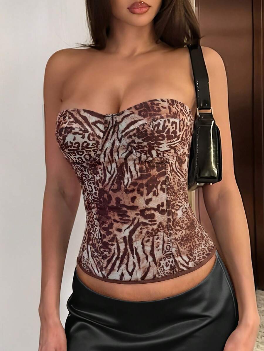 Black strapless corset top with boning, lace-up back, and a cropped slim-fit silhouette for women.