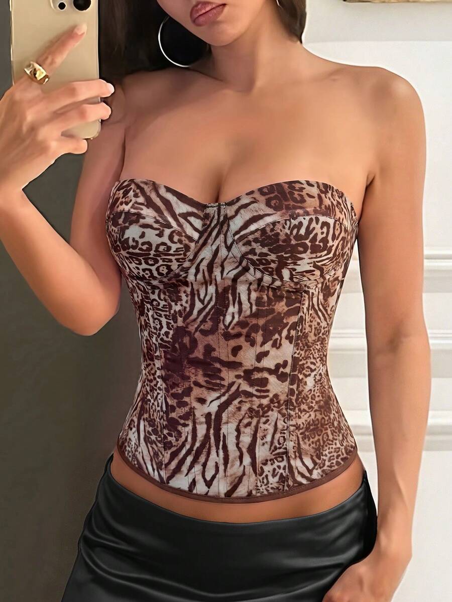 Black strapless corset top with boning, lace-up back, and a cropped slim-fit silhouette for women.