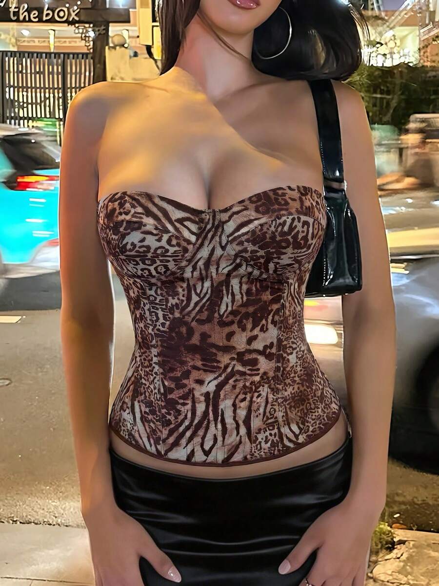Black strapless corset top with boning, lace-up back, and a cropped slim-fit silhouette for women.