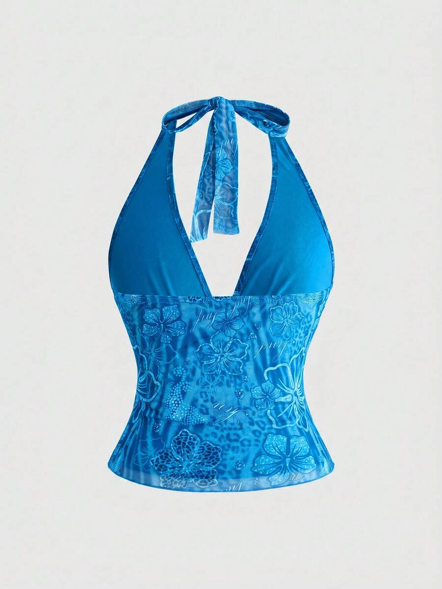 Women's pink tropical hibiscus print halter top featuring contrast lace trim and a slim fit silhouette.