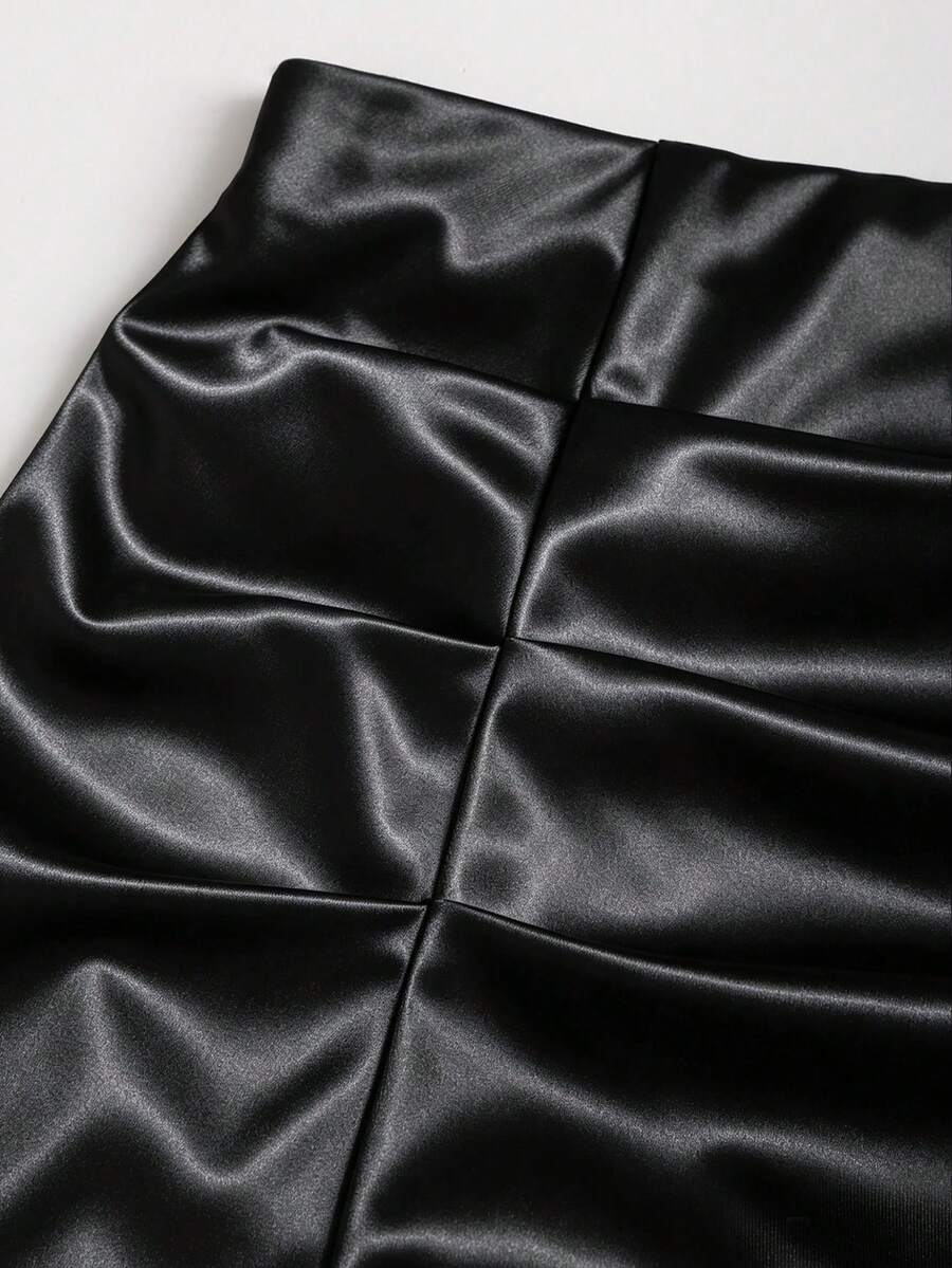 Black satin bodycon short skirt featuring contrast lace trim and mid-waist fit for women