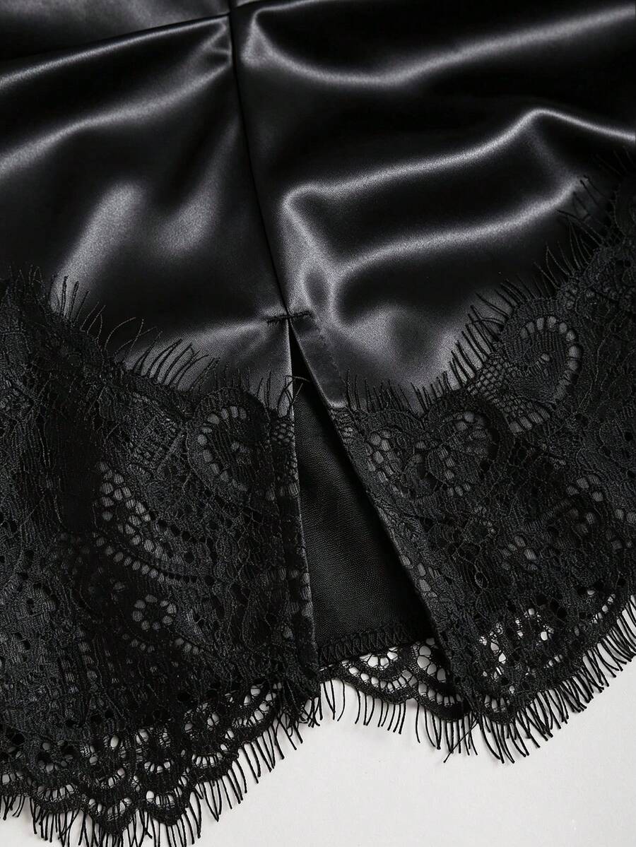 Black satin bodycon short skirt featuring contrast lace trim and mid-waist fit for women