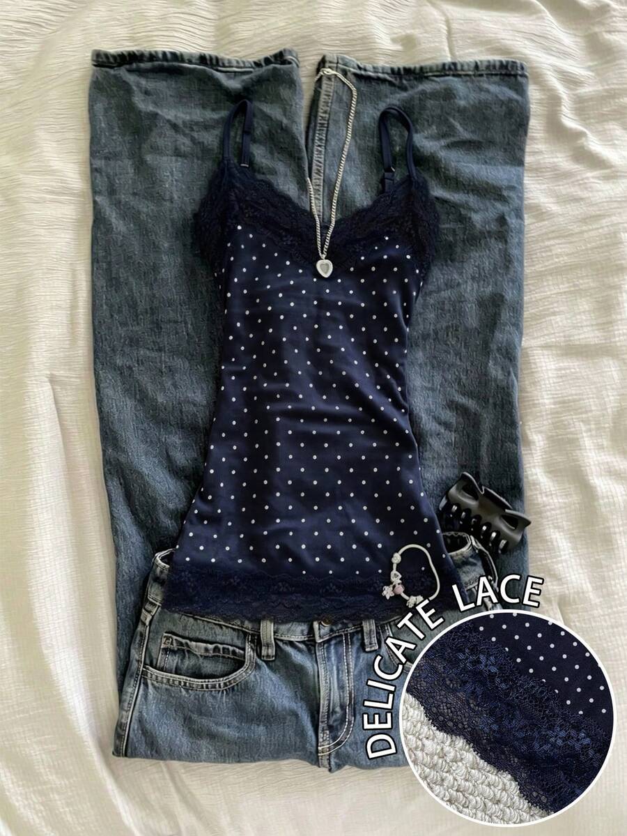 Women's solid color slim fit camisole top featuring delicate lace patchwork embroidery and tank straps.