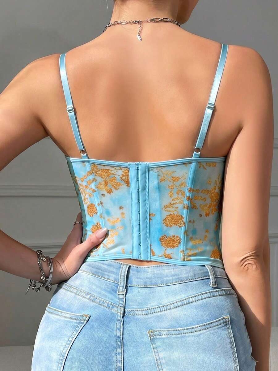 Women's brown lace trim cami corset crop top featuring a low cut neck, unlined body, and slim fit bodycon silhouette.