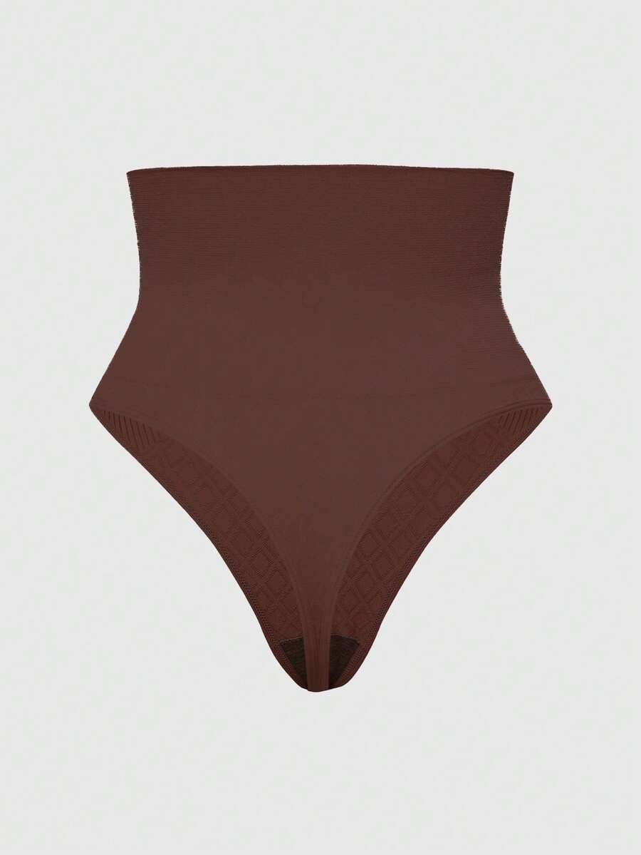 Black high waisted seamless shapewear thong for women featuring super high waist design and stretchy breathable fabric.