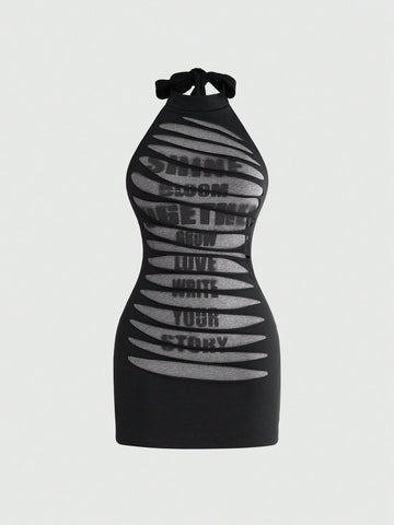 Black backless mini dress featuring letter slogan print, stand collar halter neck with tie back knot, and slim fit silhouette for festival style.