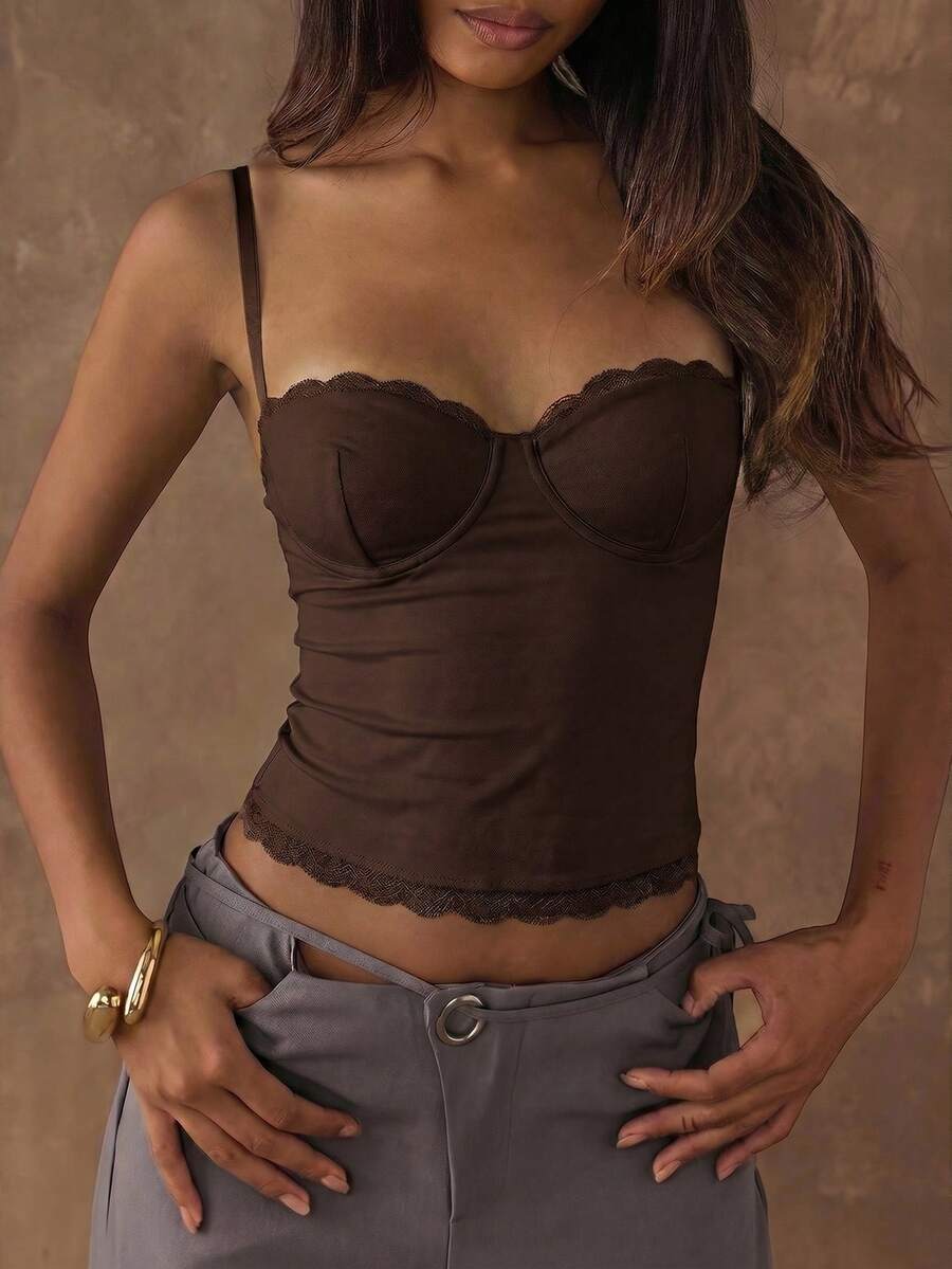 Women's black contrast lace camisole with spaghetti straps, cup detail, semi-sheer finish, and slim fit for going out or date night.