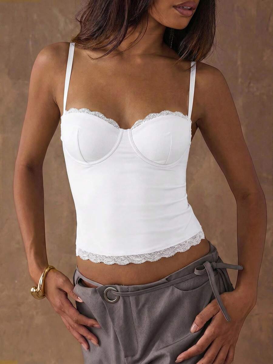 Women's black contrast lace camisole with spaghetti straps, cup detail, semi-sheer finish, and slim fit for going out or date night.