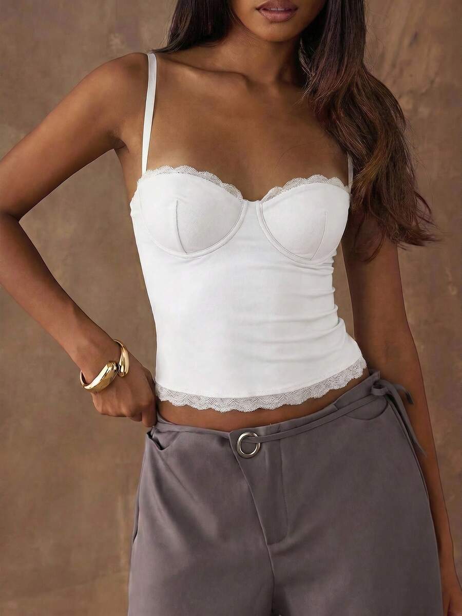 Women's black contrast lace camisole with spaghetti straps, cup detail, semi-sheer finish, and slim fit for going out or date night.