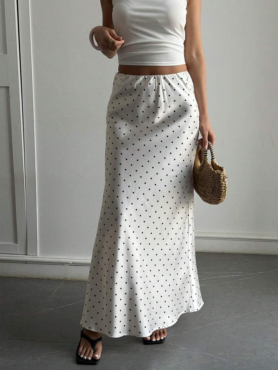 Women's white satin long dress featuring a high waist and elegant fishtail hem