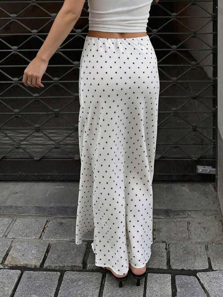 Women's white satin long dress featuring a high waist and elegant fishtail hem