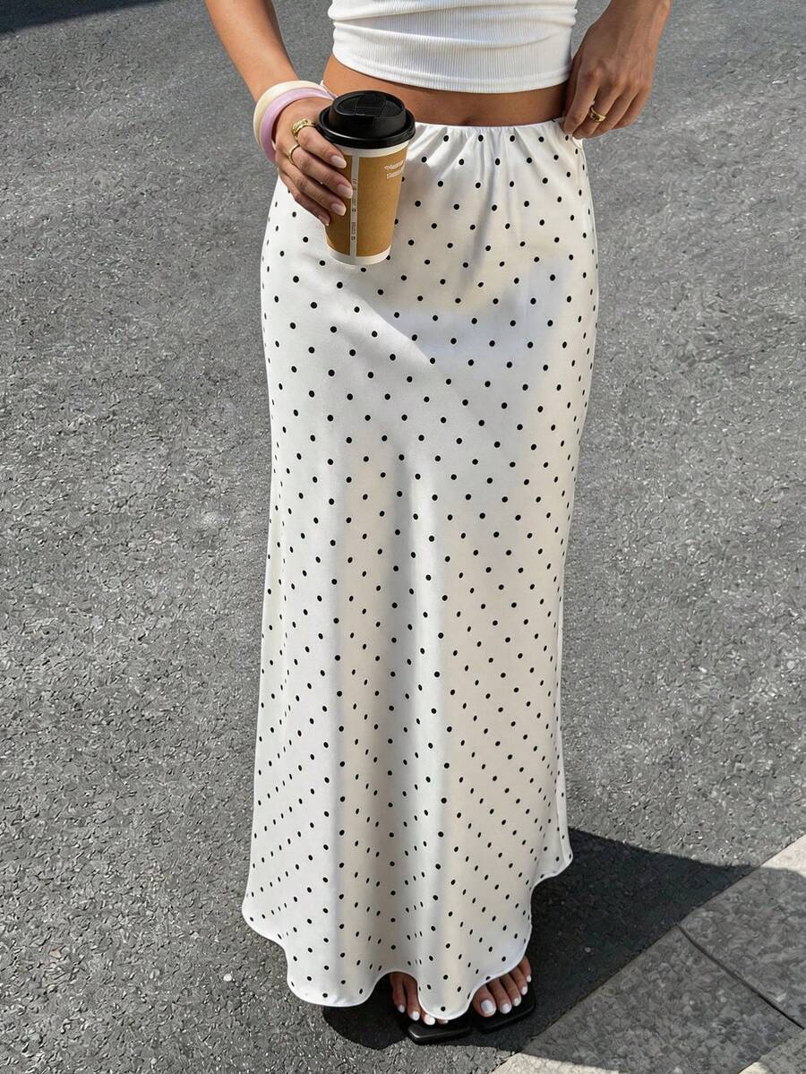 Women's white satin long dress featuring a high waist and elegant fishtail hem