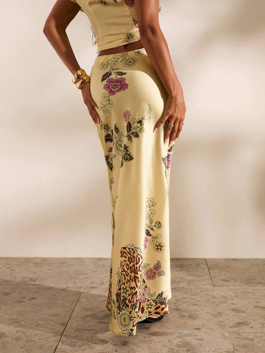 Women's black woven mermaid maxi skirt featuring a solid color design, mid waist, and 100% cotton fabric.