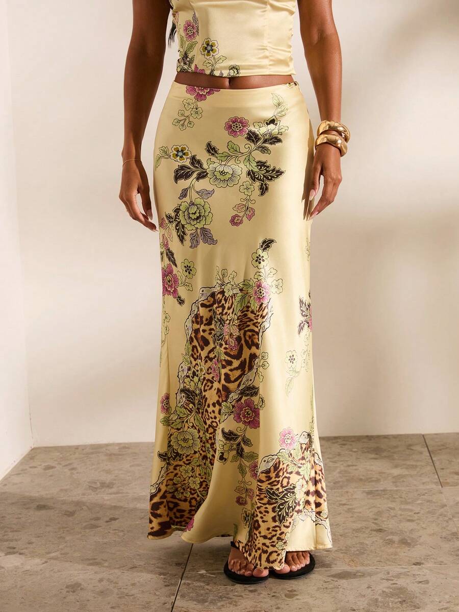 Women's black woven mermaid maxi skirt featuring a solid color design, mid waist, and 100% cotton fabric.