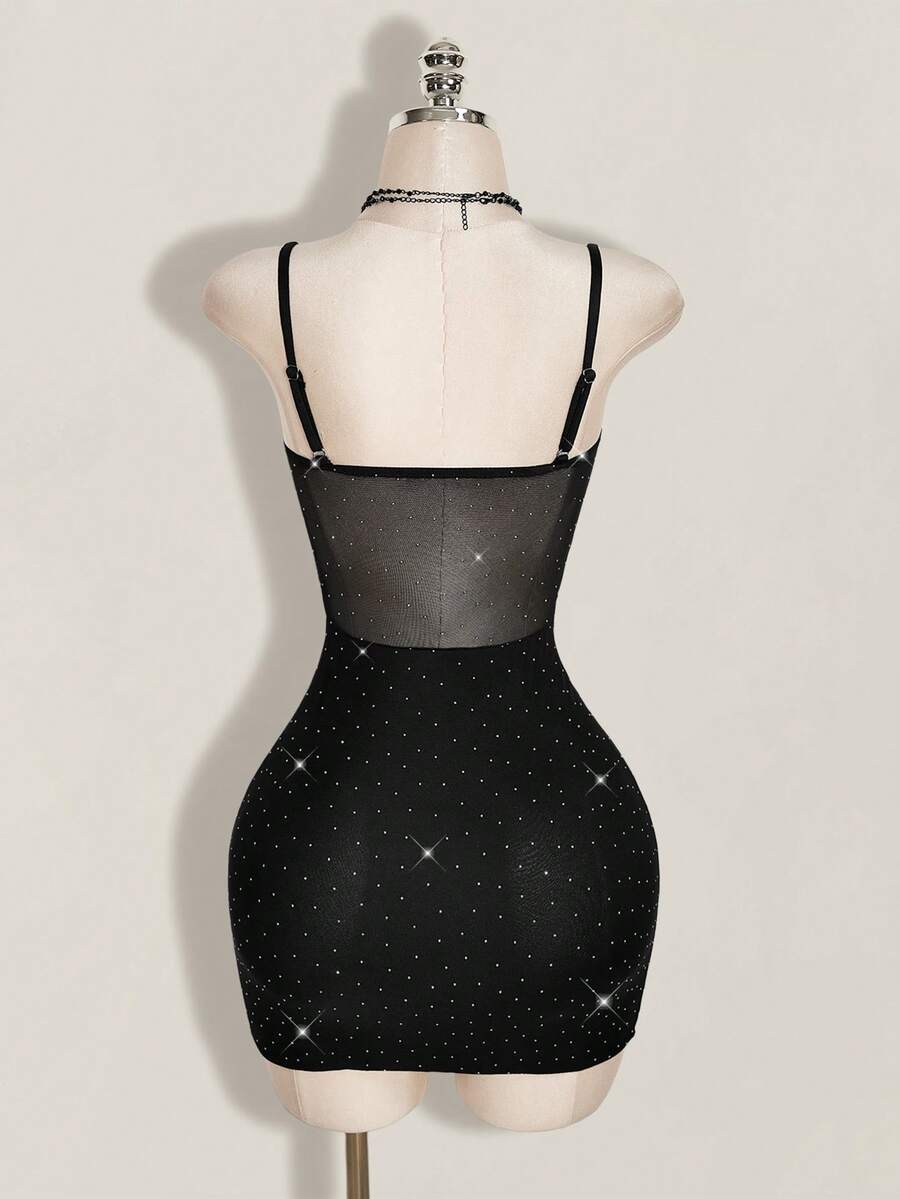Black contrast lace bustier cami bodycon mini dress for women featuring spaghetti straps and a backless design.