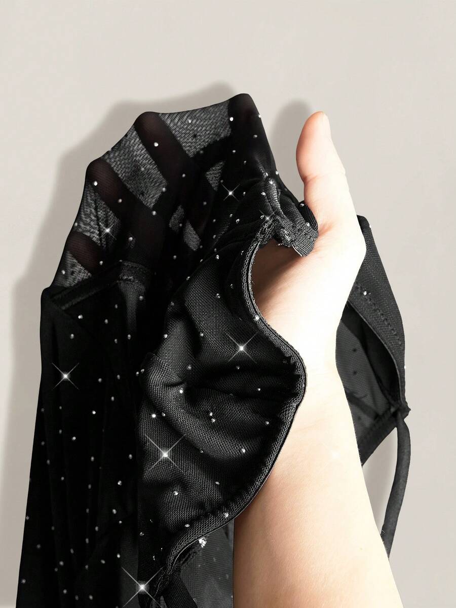 Black contrast lace bustier cami bodycon mini dress for women featuring spaghetti straps and a backless design.