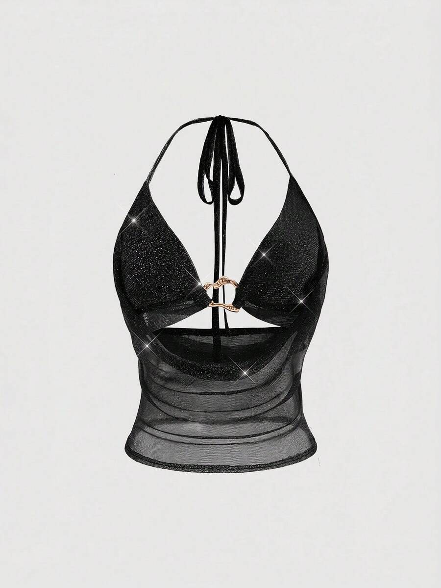 Women's glitter backless halter crop top with a draped neck and tie-up straps in metallic black knit fabric.