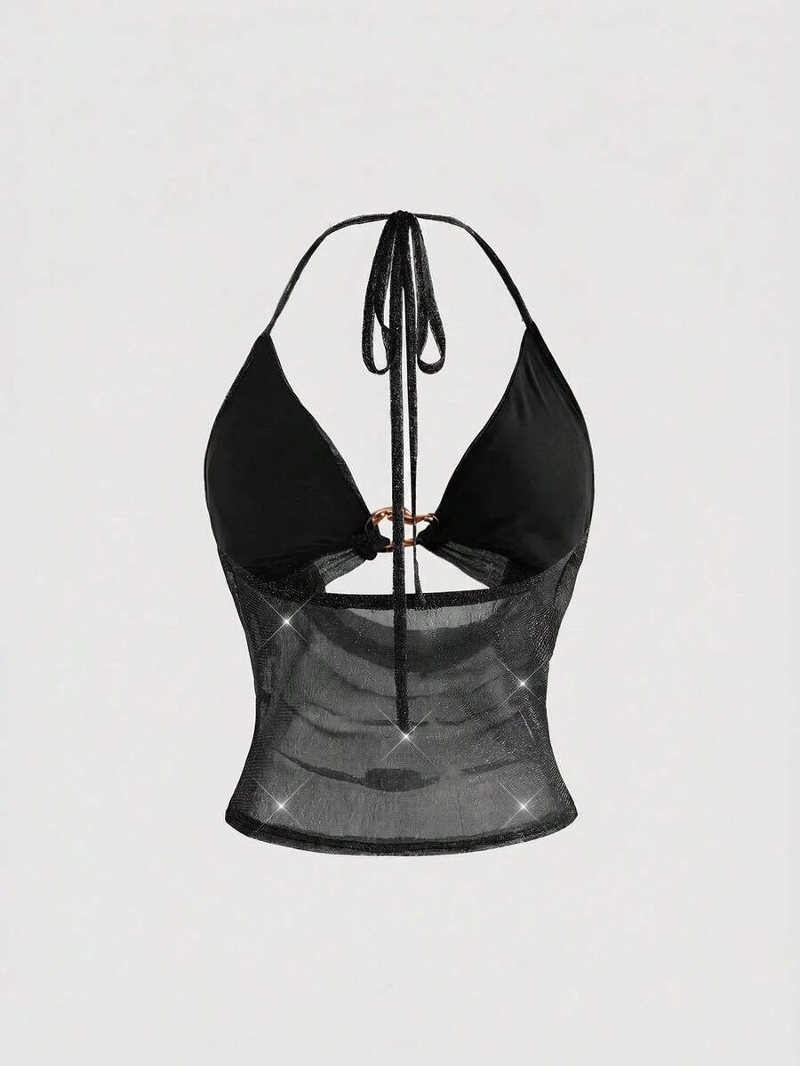 Women's glitter backless halter crop top with a draped neck and tie-up straps in metallic black knit fabric.