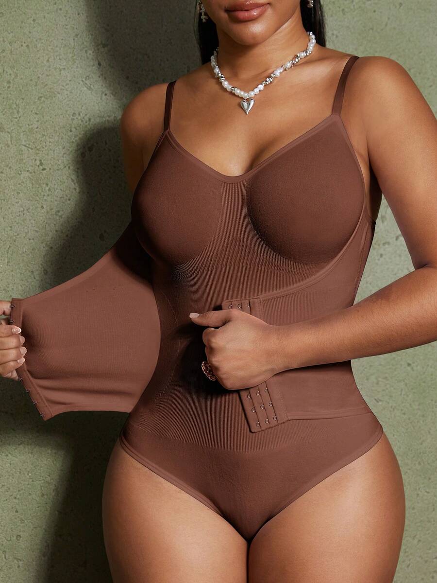 Women's backless waist shaping shapewear bodysuit in black featuring high stretch fabric and ultra light tummy support.