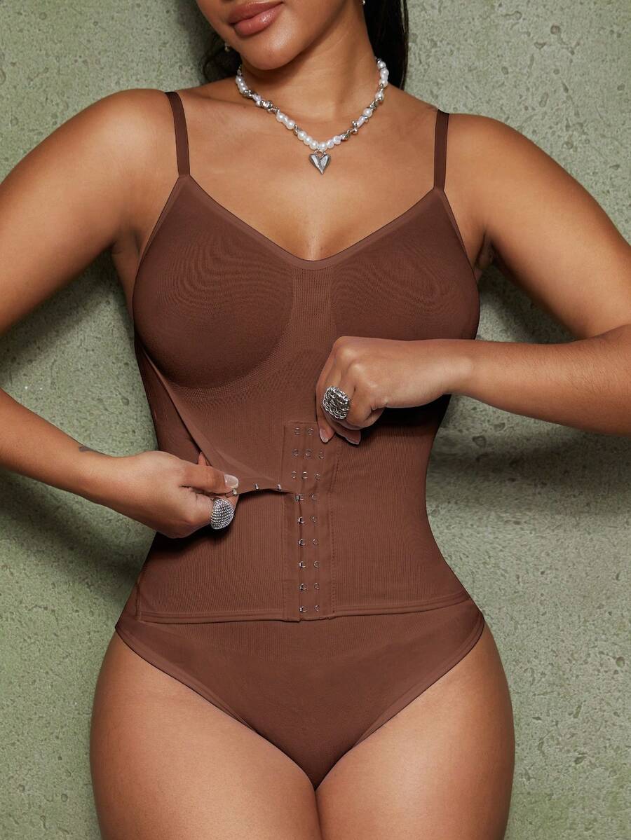 Women's backless waist shaping shapewear bodysuit in black featuring high stretch fabric and ultra light tummy support.