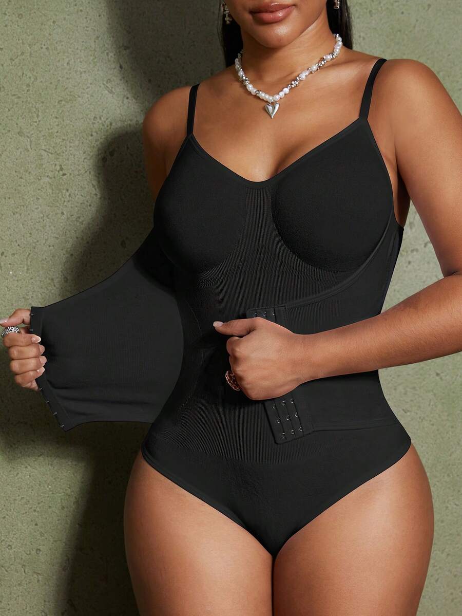 Women's backless waist shaping shapewear bodysuit in black featuring high stretch fabric and ultra light tummy support.