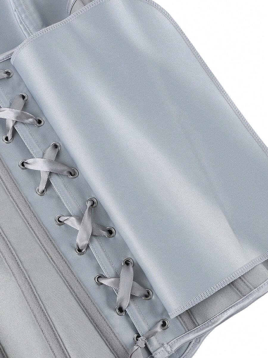 Black overbust corset top bustier with 11 steel bones, side zipper, and grommet eyelet detailing for waist shaping.