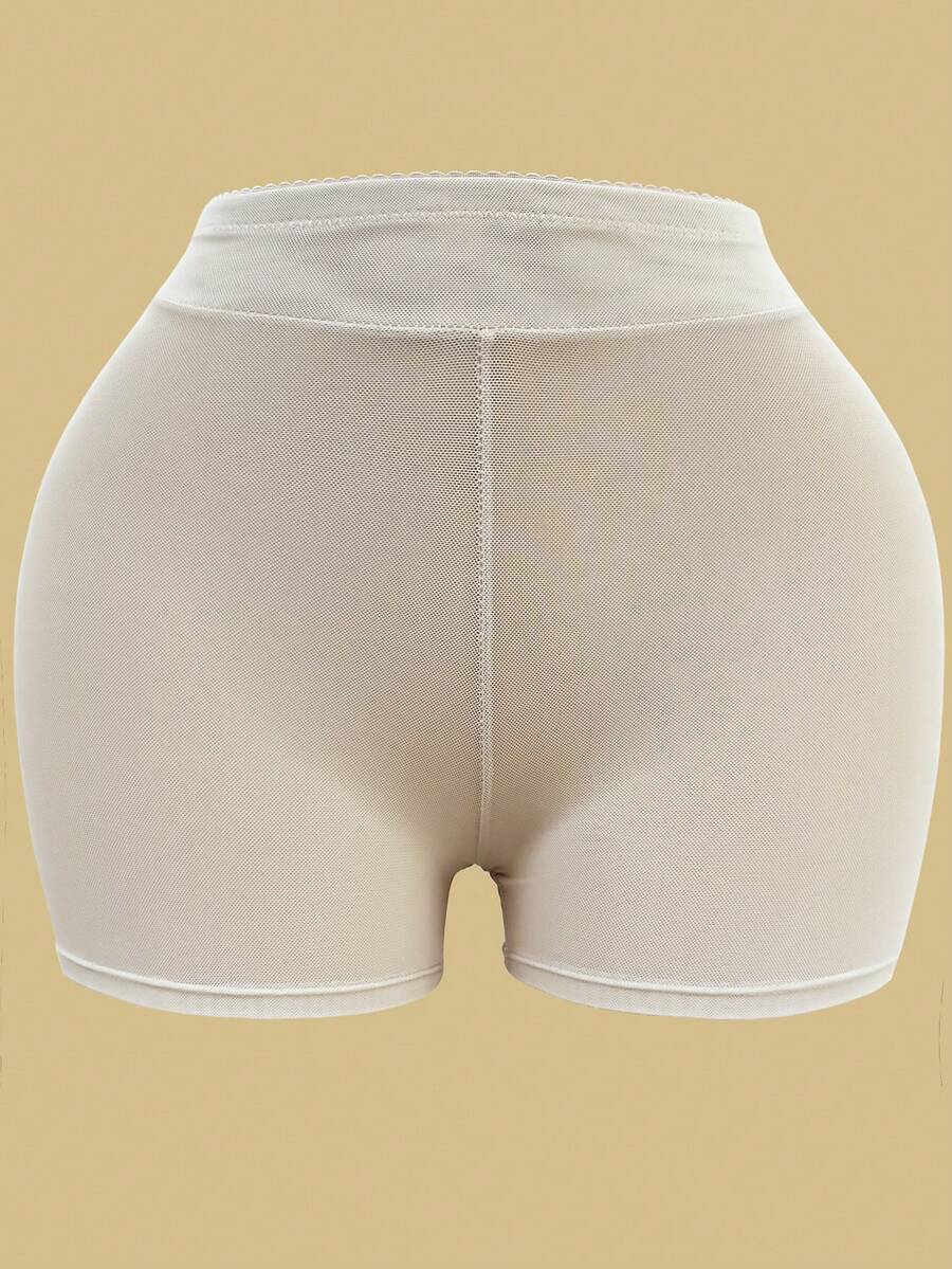 Apricot high-waist seamless butt lifting shapewear shorts with removable foam padding for women.
