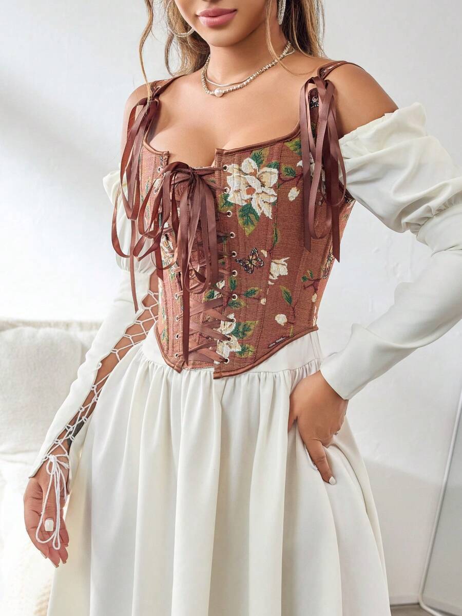 Women's retro floral print bustier top with shoulder straps, lace-up tie back, zipper, and boned construction in a romantic vintage style.