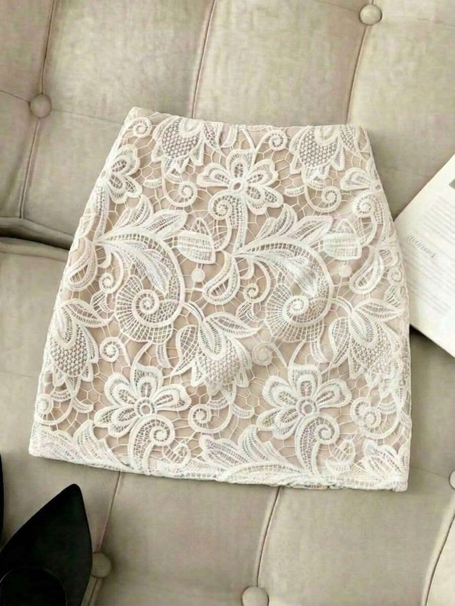 Women's short guipure lace skirt with lettuce trim and skinny mid-waist fit.